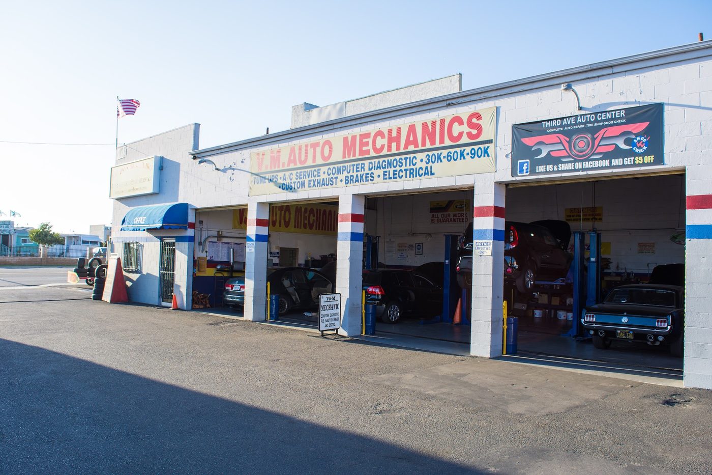 Service bays under the V.M. Auto Mechanics banner: tune ups, A/C, computer diagnostic, 30K-60K-90K, exhaust, brakes, electrical